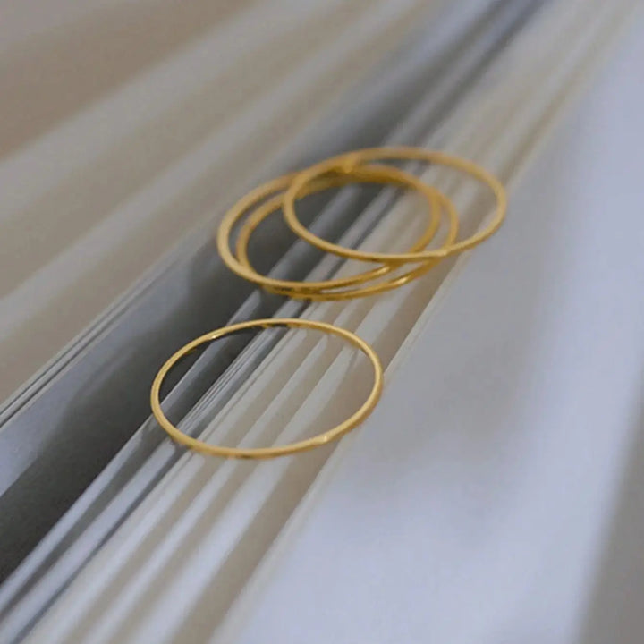 Four piece minimalist Japanese and Korean style cubic zirconia ring set