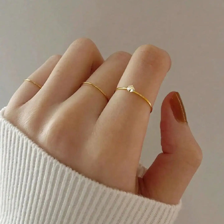 Four piece minimalist Japanese and Korean style cubic zirconia ring set